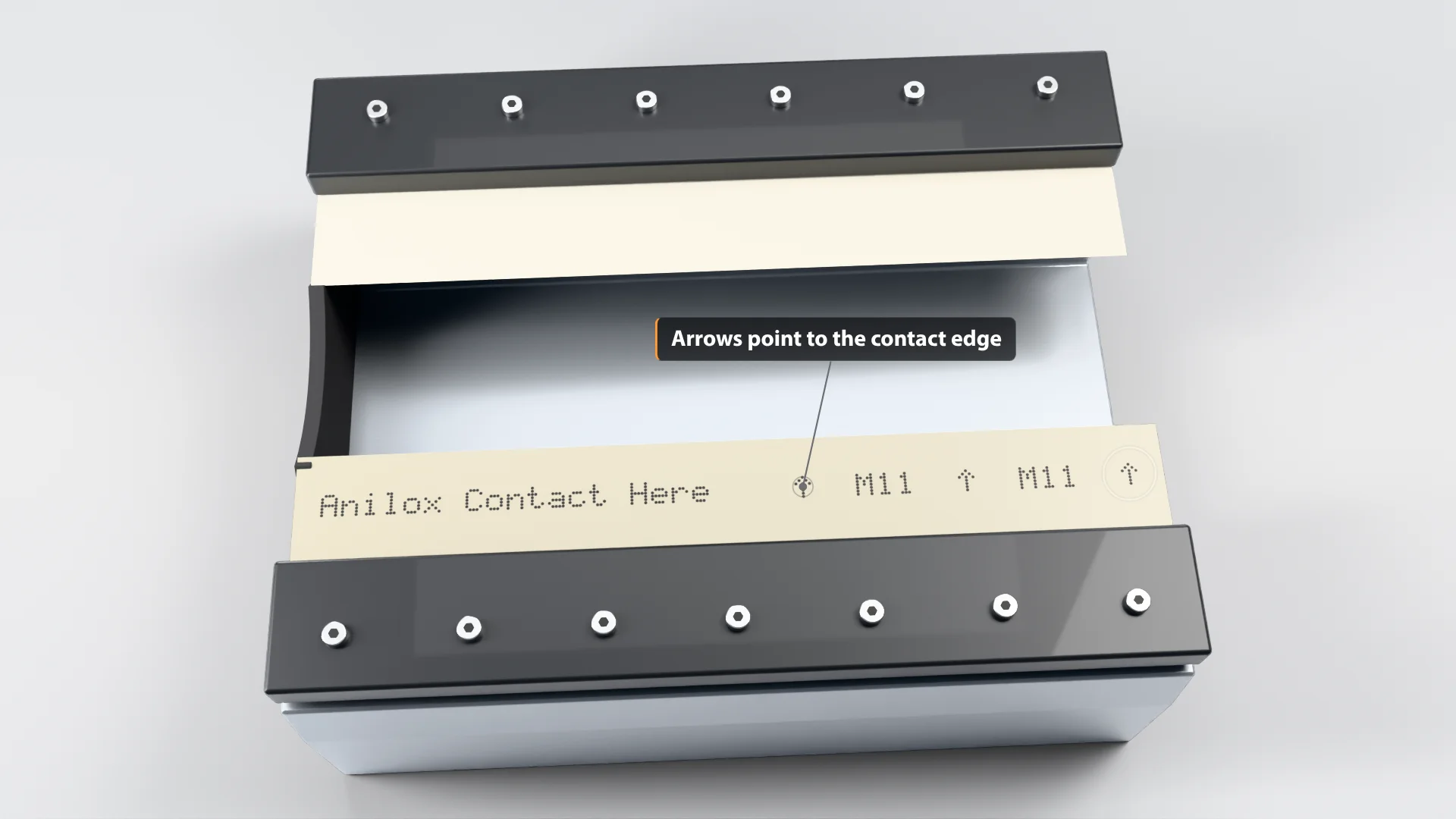 TruPoint MicroTip doctor blade seated in a chamber, printed Anilox Contact Here text and arrows pointing to the contact edge
